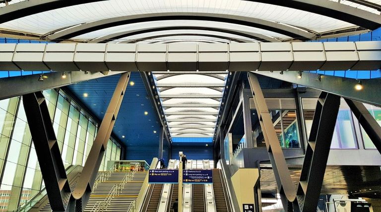 Escalators and lifts go up and down the spectacular bridge, which gives the access to the platforms at Reading station that aren't by the main concourse.